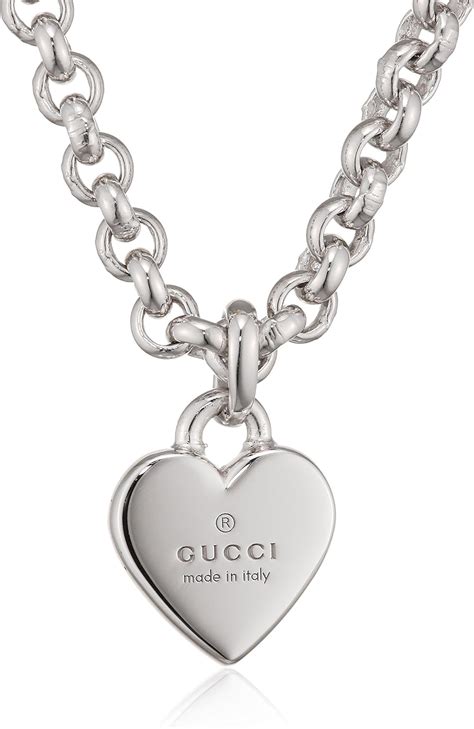 black and white necklace gucci|Gucci necklace with heart pendant.